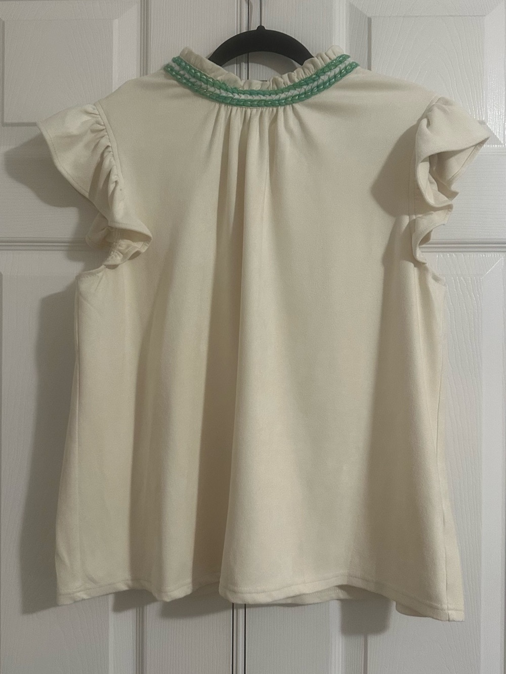 Girls Cream Ruffle Sleeve Top with Green Trim